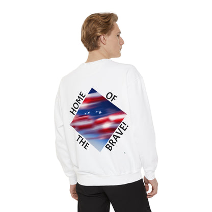 Unisex Garment-Dyed Sweatshirt with  banner of America flag ove clouds words land of the Free./ home of the Brave.