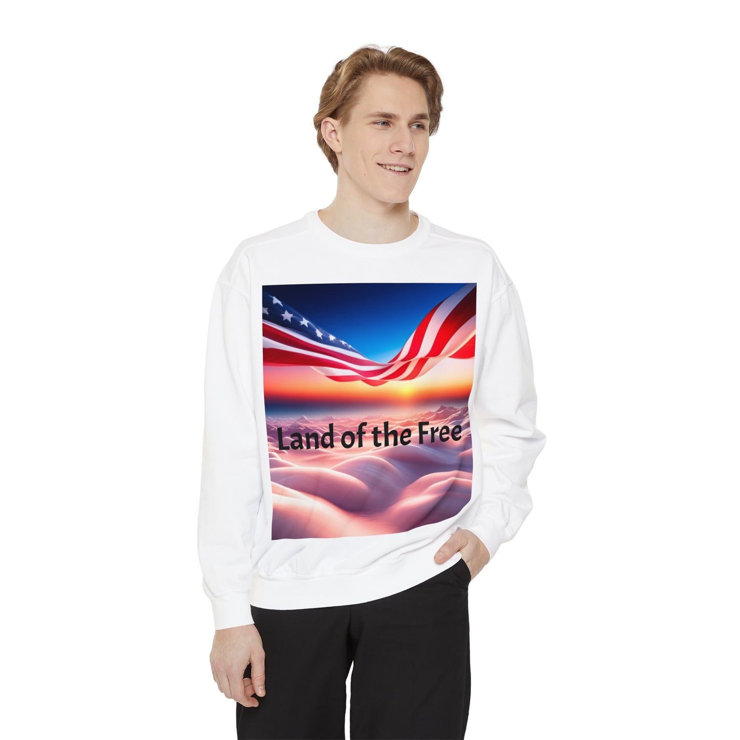 Unisex Garment-Dyed Sweatshirt with  banner of America flag ove clouds words land of the Free./ home of the Brave.