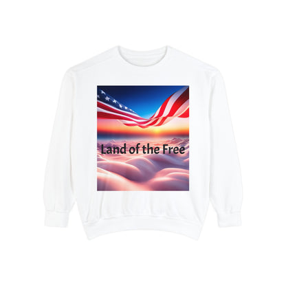 Unisex Garment-Dyed Sweatshirt with  banner of America flag ove clouds words land of the Free./ home of the Brave.